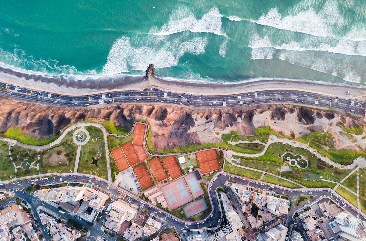 bird's eye photography of village beside water - Lima, Peru