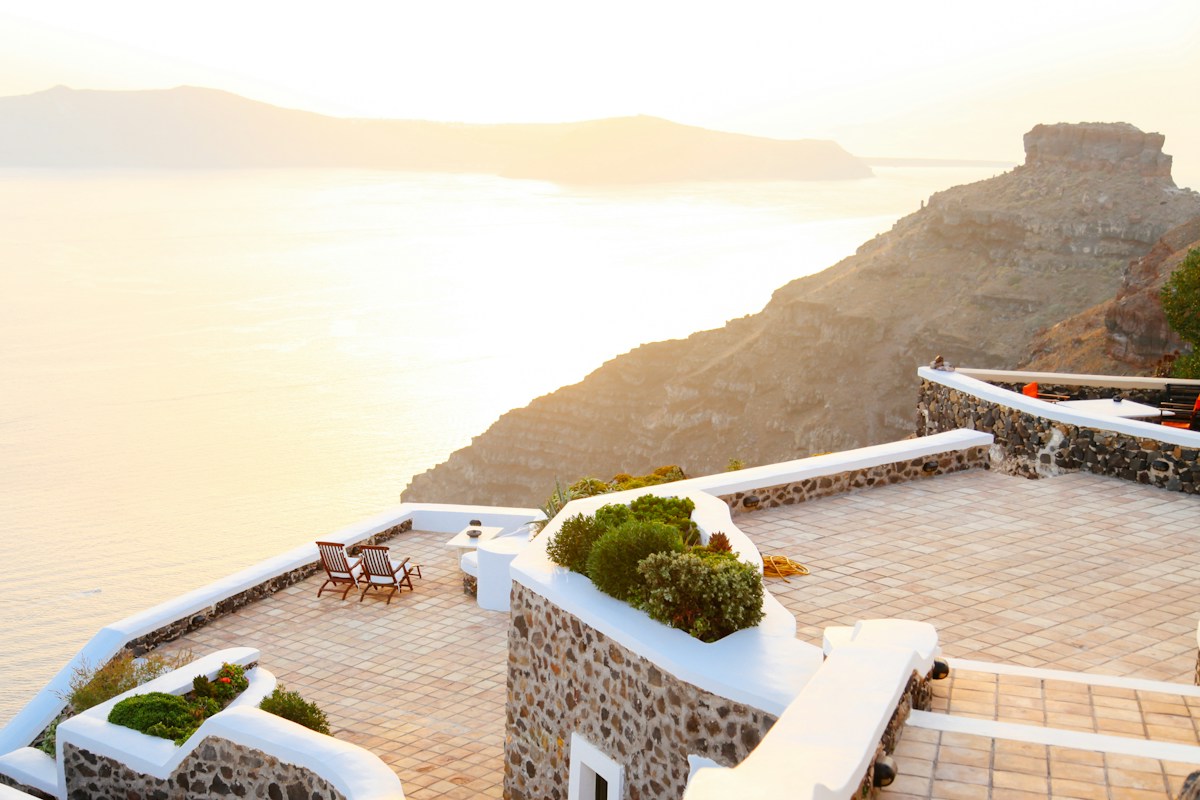 aerial photograph of building near body of water - Santorini Greece