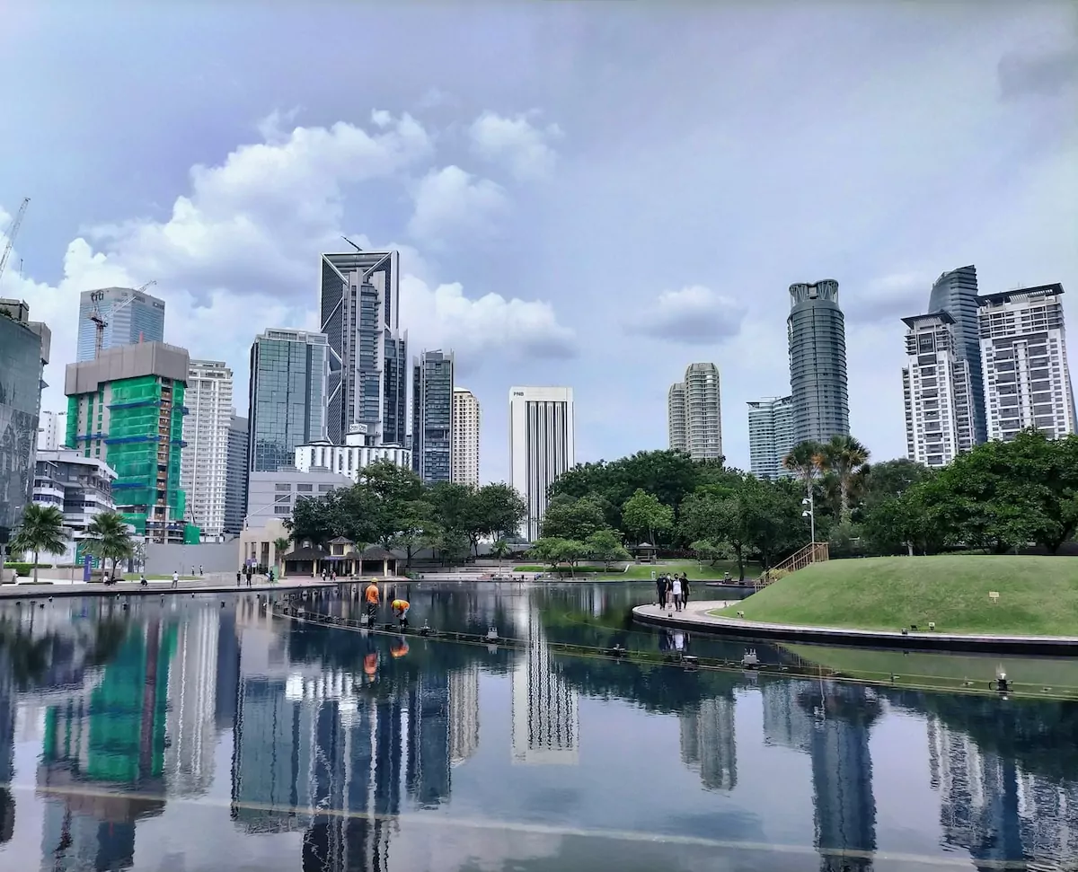 city skyline under cloudy sky during daytime - Kuala Lumpur City Centre