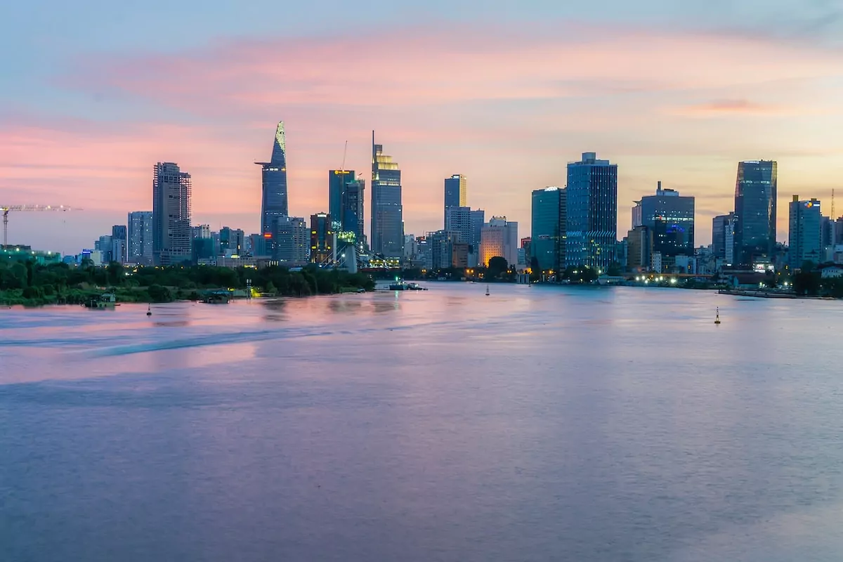 city skyline across body of water during daytime - Ho Chi Minh City Vietnam