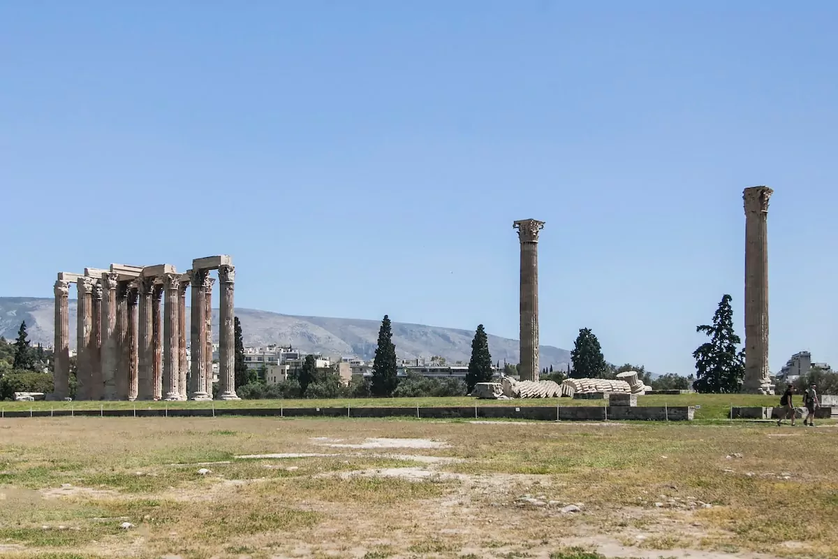 brown concrete building under blue sky during daytime - Temple of Olympian Zeus