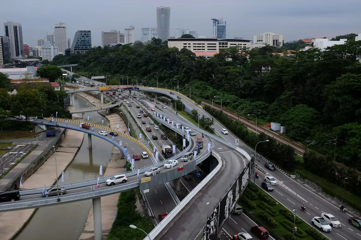 an aerial view of a busy highway in a city - Chow Kit Kuala Lumpur