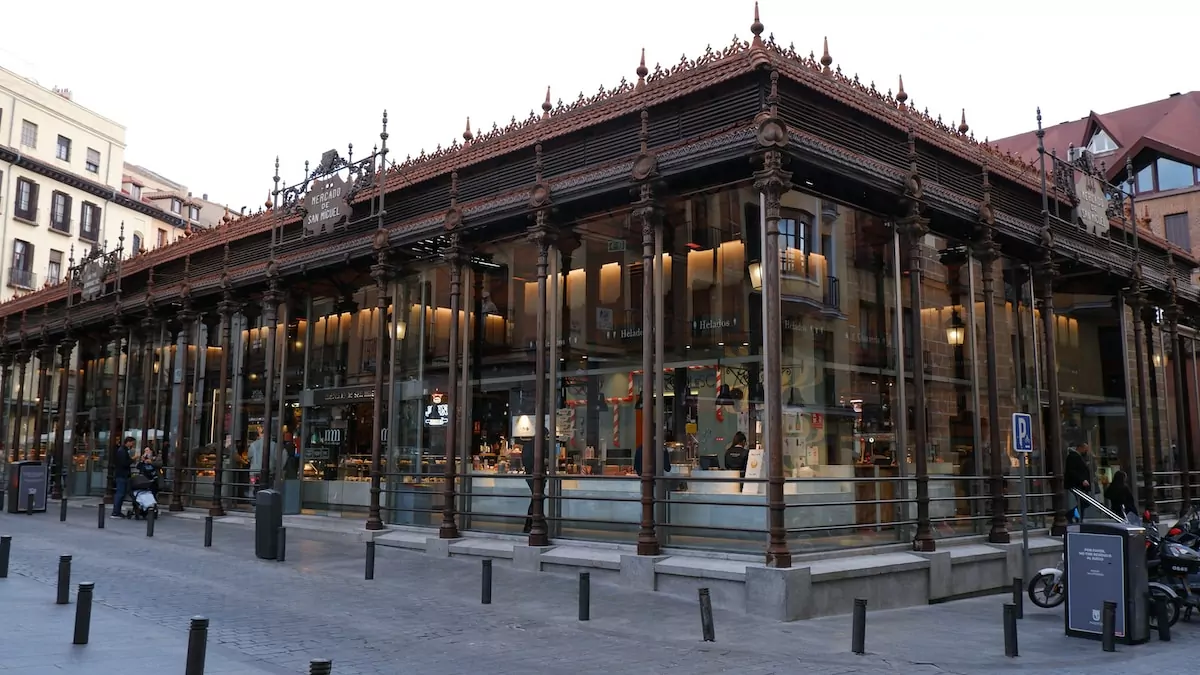 a building with a glass front - Mercado de San Miguel, Madrid, Spain