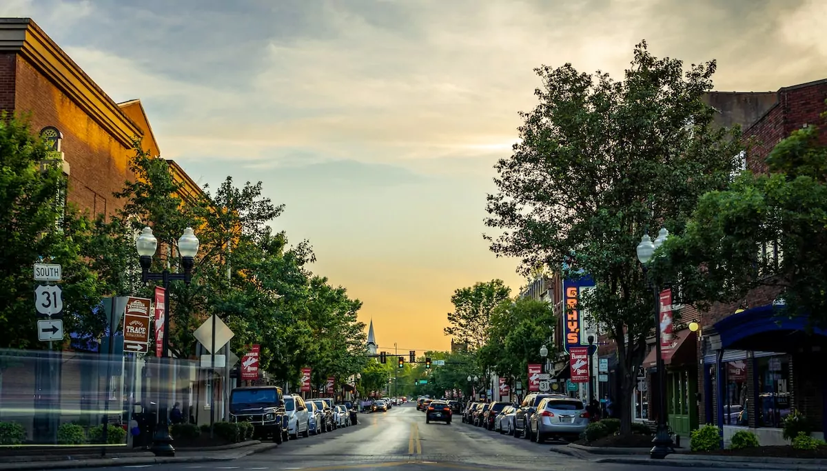 landscape photography of vehicles parked on side of a street - Tennessee Franklin USA