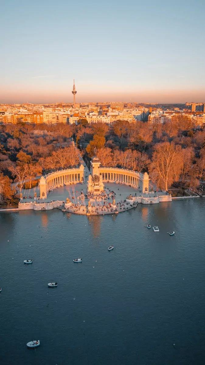 Madrid Spain - aerial view of white and brown building near body of water during daytime