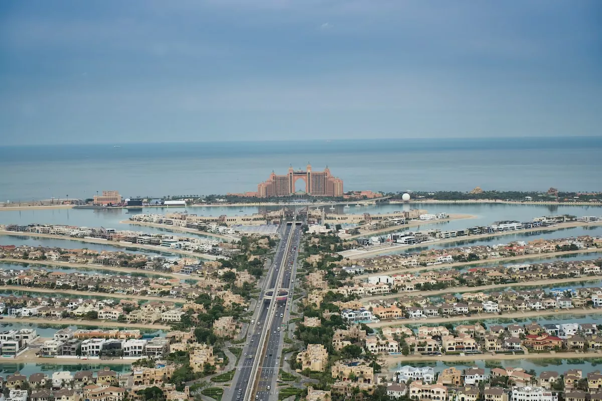 an aerial view of a city and a body of water - Palm Jumeirah